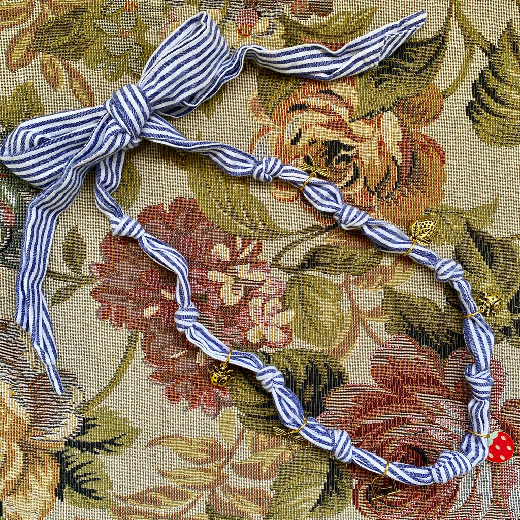 Collar rayado frutilla